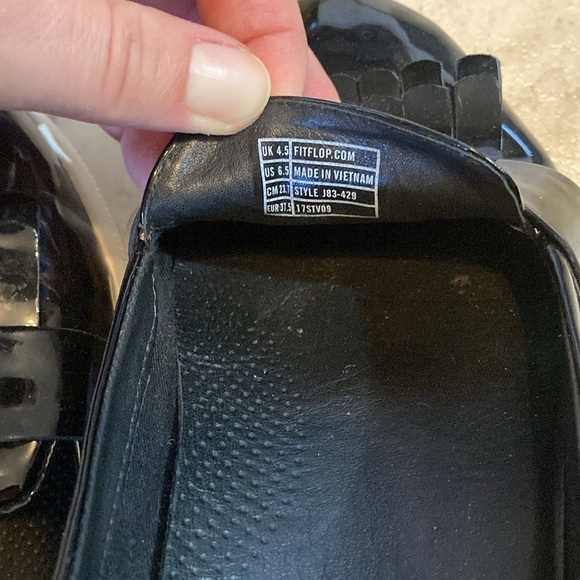 Fit flip black shiny frilly loafers style black shed with small mark on one toe. - Picture 8 of 10